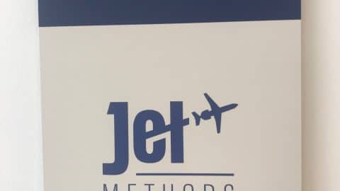 Carlsbad jet Center ADA Suite Sign